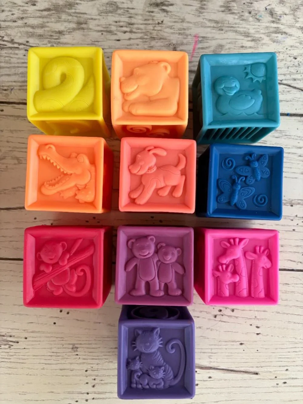 B. Toys Baby Building Blocks One Two Squeeze